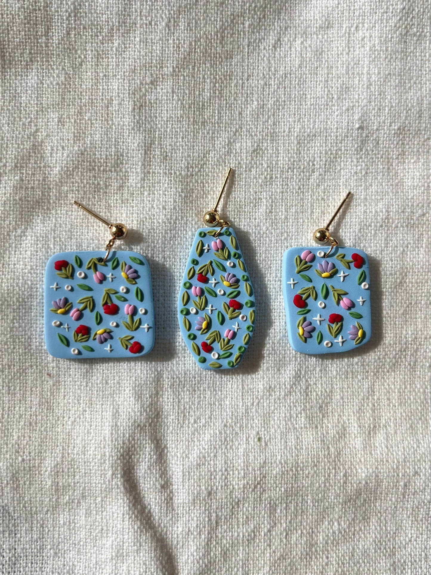 Flower Power on Blue Rounded Trapezoid Earrings