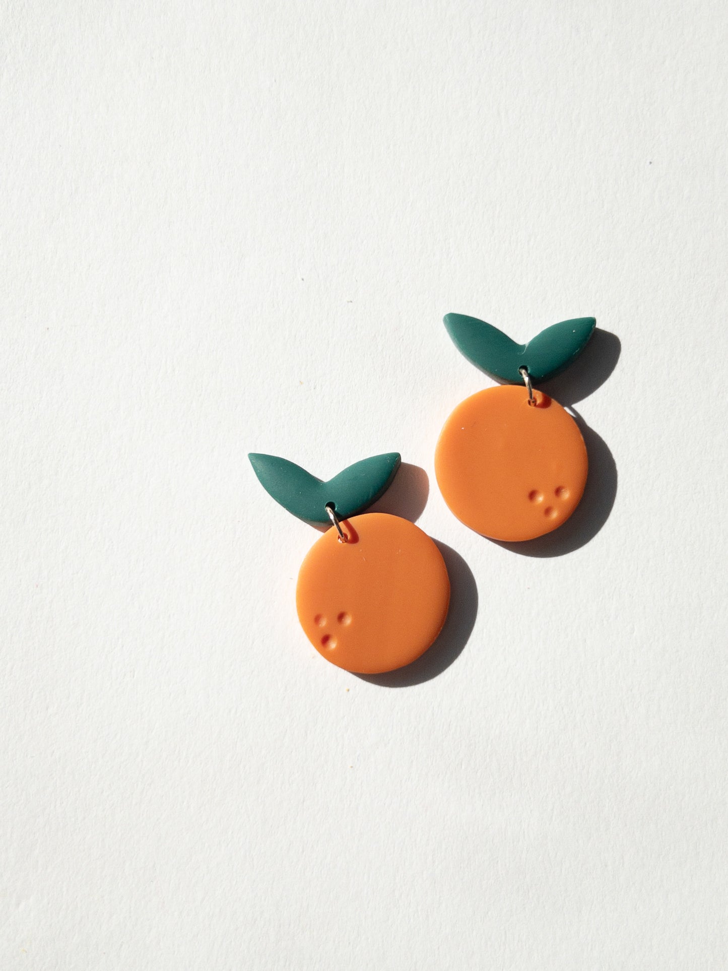 small orange earrings