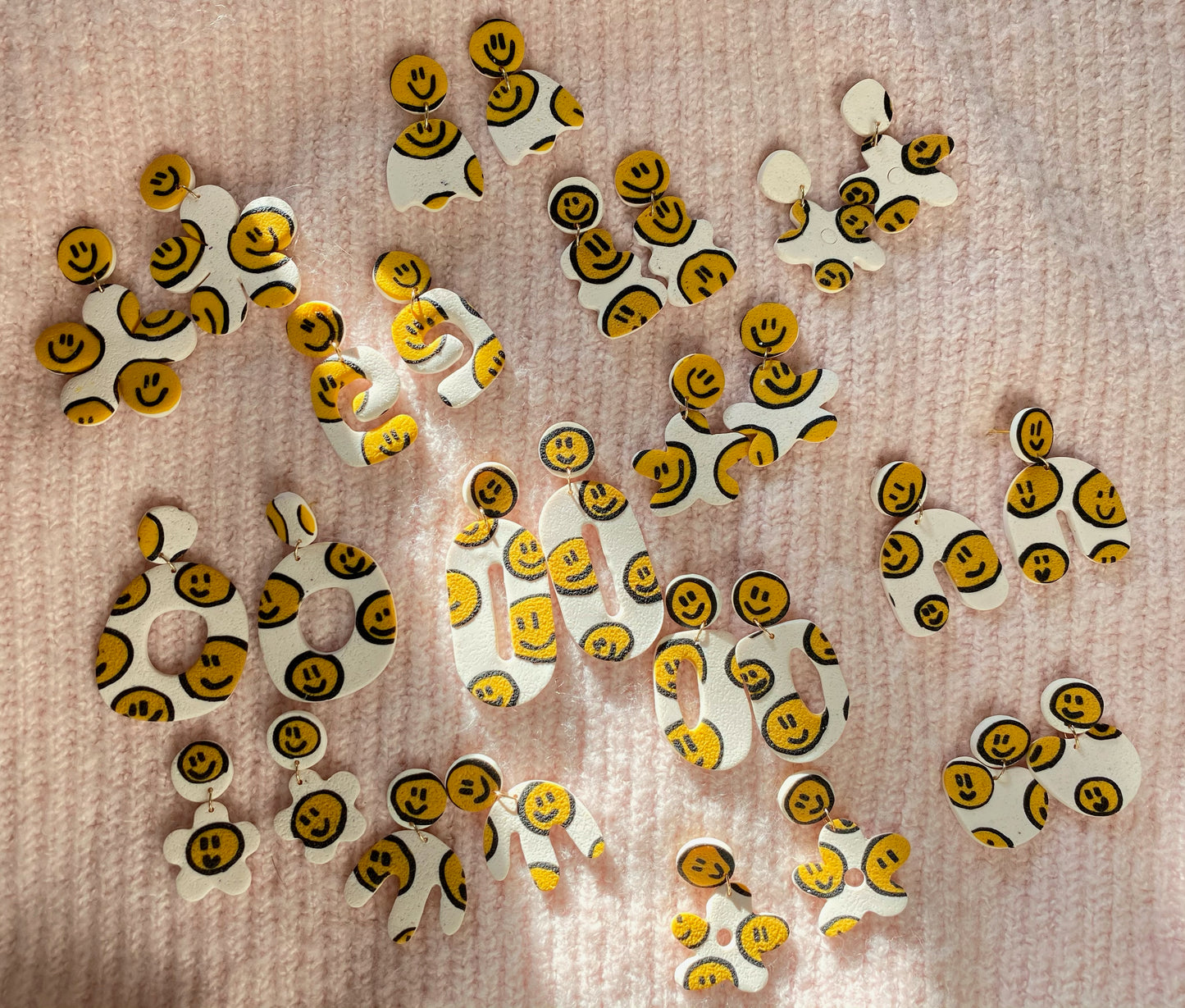 smiley on white wavy flower earrings