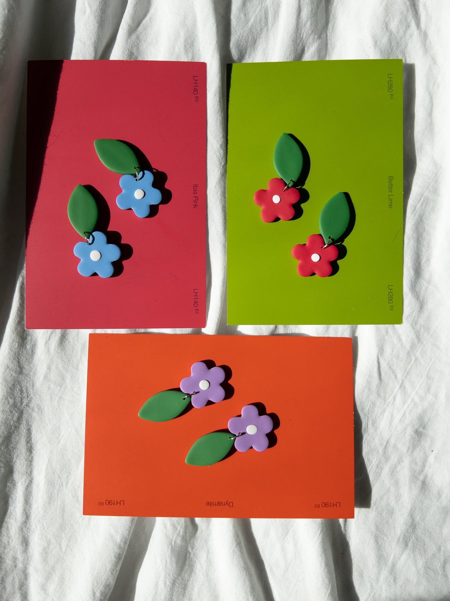 blue 6-petal medium flower earrings