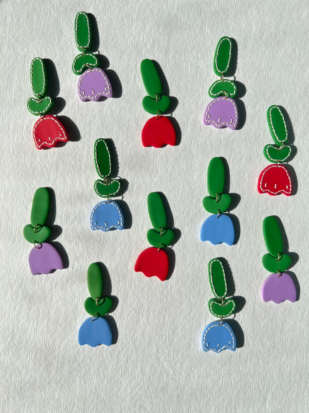 cherry red tulip earrings with hand sewn details