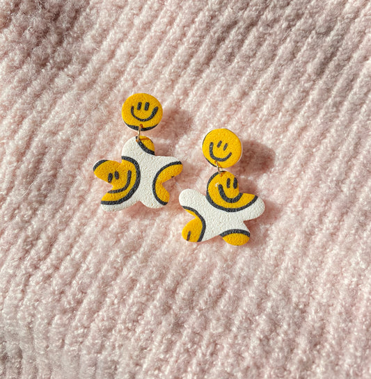 smiley on white wavy flower earrings