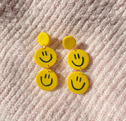 yellow smiley on smiley face dangles